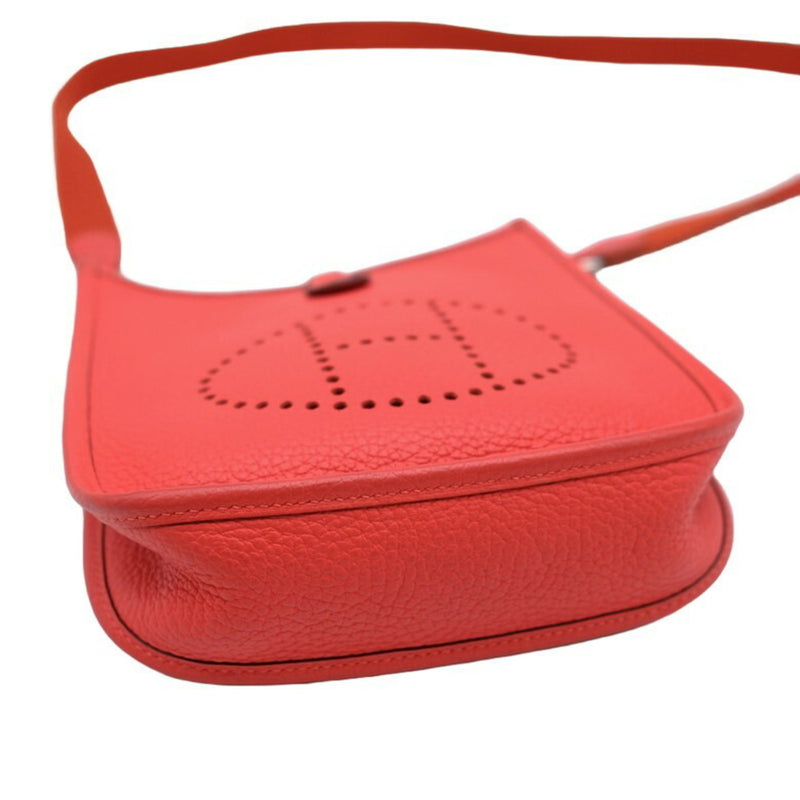 HERMES Evelyn TPM shoulder bag in leather, Taurillon Clemence, Rouge Kutomato, red