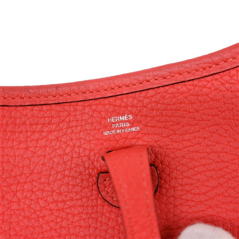 HERMES Evelyn TPM shoulder bag in leather, Taurillon Clemence, Rouge Kutomato, red