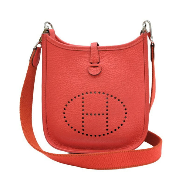 HERMES Evelyn TPM shoulder bag in leather, Taurillon Clemence, Rouge Kutomato, red